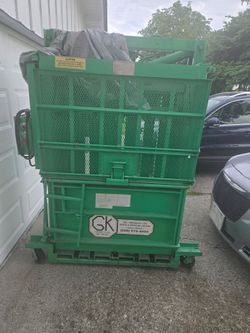 Cardboard baler machine