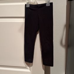 Girls black leggings, size 4