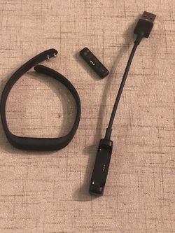 Fitbit Flex 2 activity tracker and charger works great