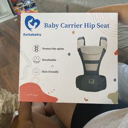Baby Carrier With a Hip Carrier