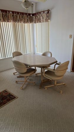Dining Table with 4 Rolling Chairs $80 OBO