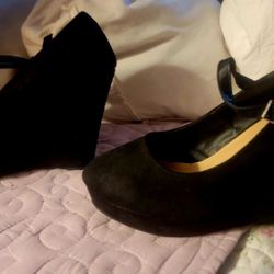 Torrid Black Swayed wedges.