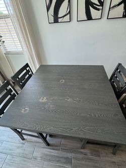 Kitchen table Table is in great condition except the water spots on top  It can be painted  Chairs are in great condition