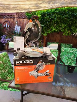 Ridgid 15 Amp 10 in. Corded ((Dual Bevel)) Miter Saw with LED Cut Line Indicator. Slightly used.
