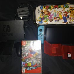 Nintendo Switch and 3 mario games