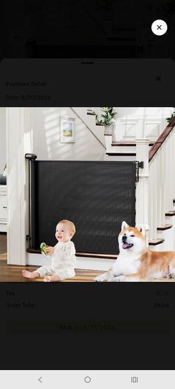 Retractable baby gate