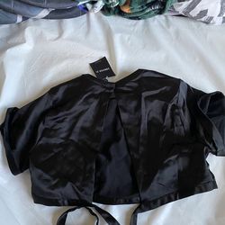 Cropped black silk top with open back tied