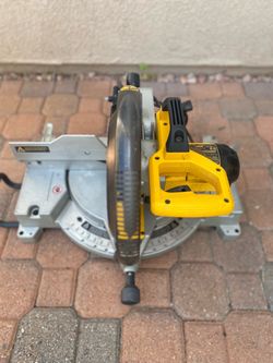 Selling a Dewalt 12” compound miter saw in good condition, missing dust bag , comes with fine finish 12” blade