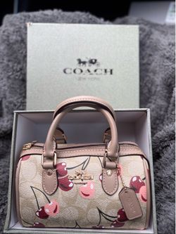 Cherry coach bag