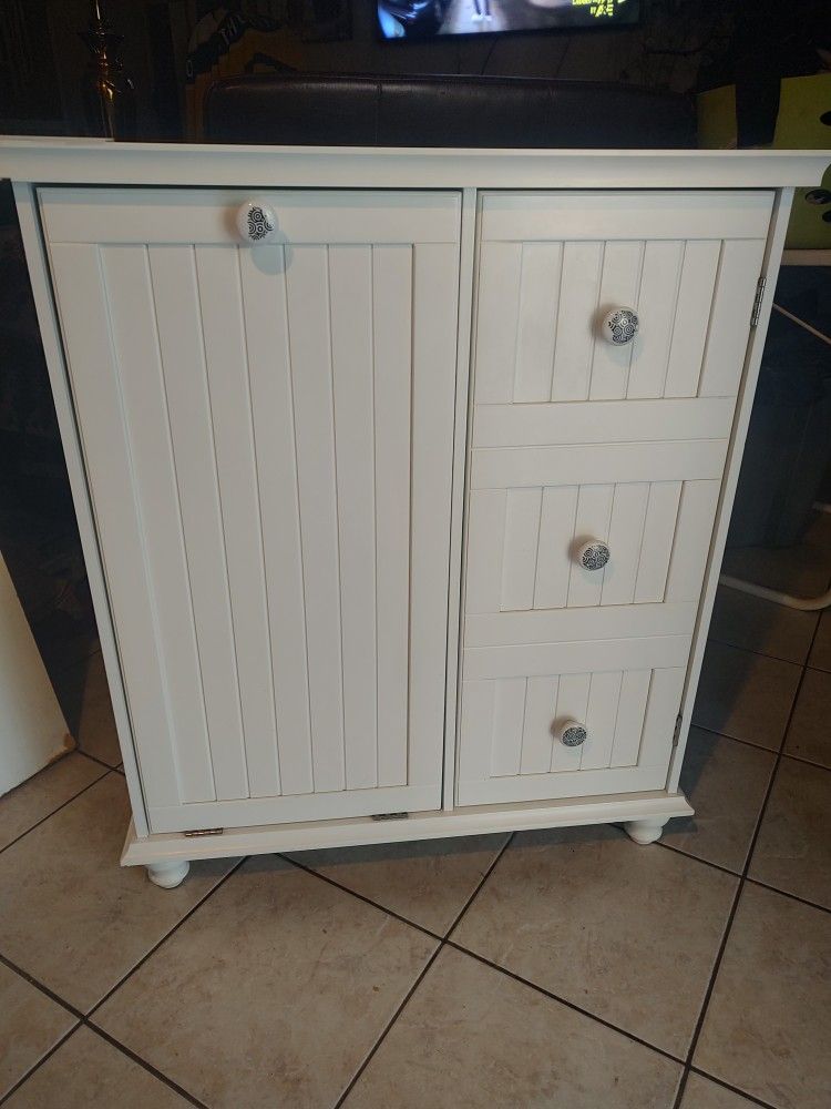 Storage cabinet with Shelves and Laundry Hamper for sale!