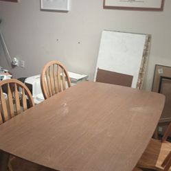 Table and four wooden chairs 