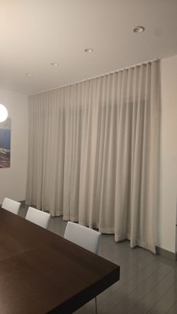 drapery and roller shades