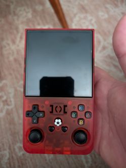 Retro game arcade console like Gameboy with over 20,000 games