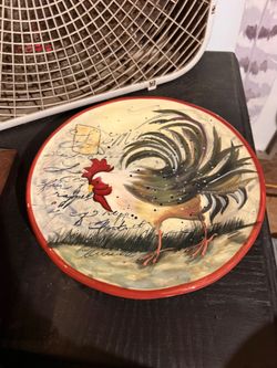 8.75-inch salad plate is part of the "Le Rooster" collection designed by Susan Winget for Certified International