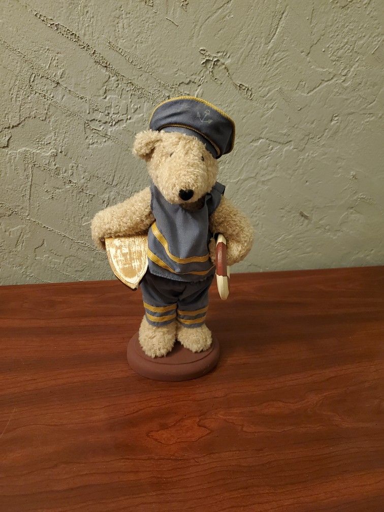 Nautical Bear Holding A Boat And Life Saver Floater