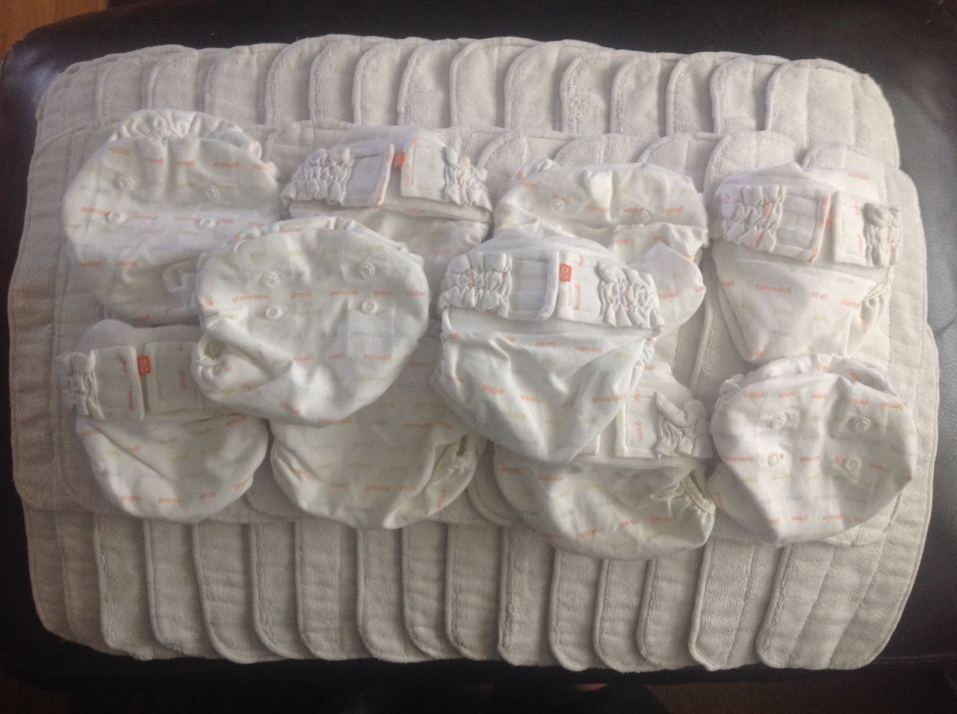 SIZE X-SMALL (NEWBORN) GDIAPERS WITH UMBILICAL CORD SNAP DOWN AND 44 CLOTH INSERTS