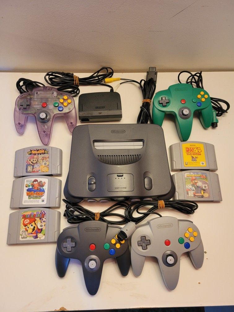 Nintendo 64 Japanese Ver (NUS-001): Included; 4 Controllers, 5 Games