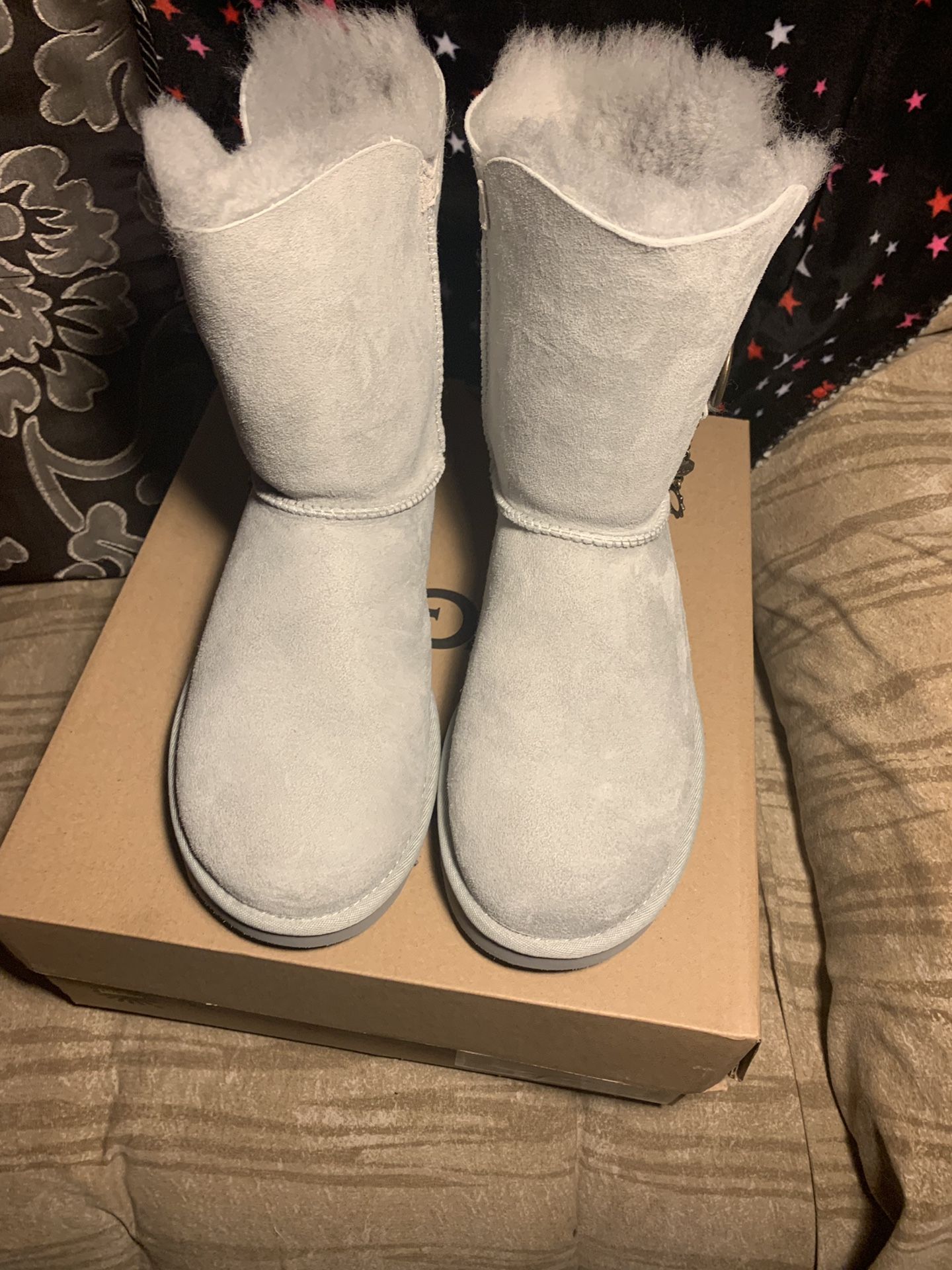 New and authentic Ugg Boots color Gray size 7
