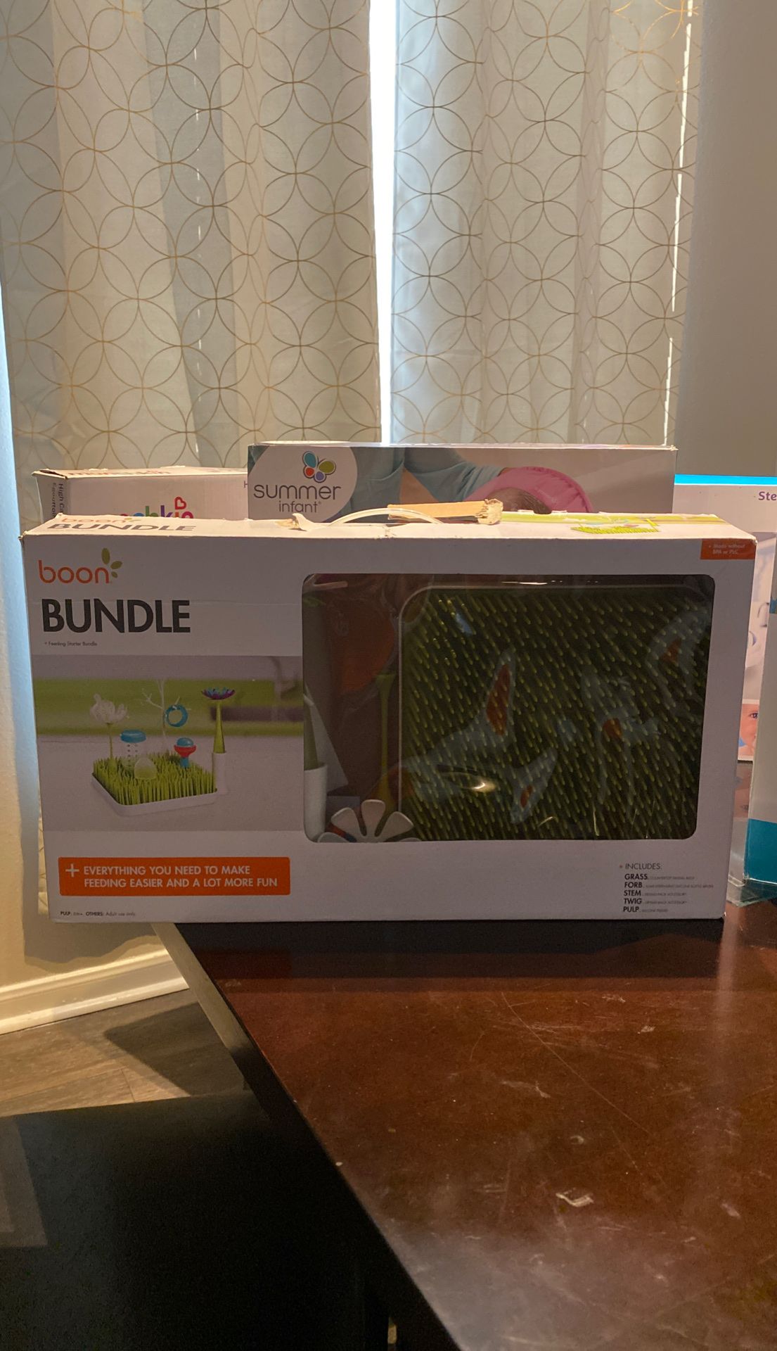 Baby bouncer/bather/sterilizer/drying racks