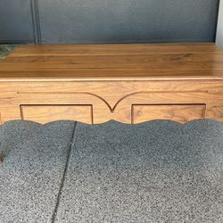 French country-style solid wood coffee table with two drawers and cabriole legs. With lift top.