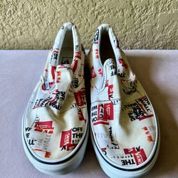 Vans “packing tape” slip ons