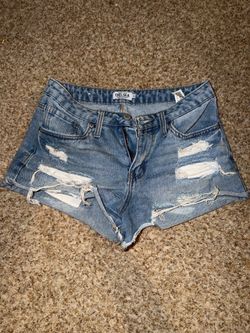 Chelsea brand light wash denim shorts with heavy distressing and frayed hems size 3