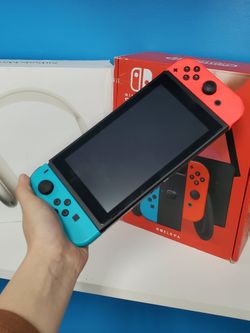 Nintendo Switch - V2 with Red and Blue Joy-Con HAC-001(-01) Fair