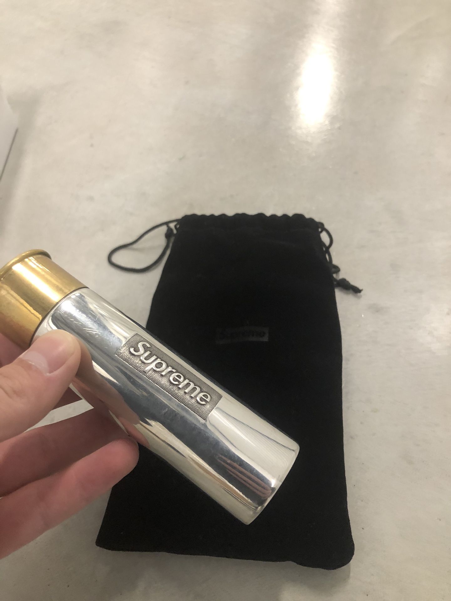 Supreme X English Pewter Company Cartridge Flask Color: Silver/Gold  Condition: used, has some scratches It is from 2018 This piece is very rare  Co for