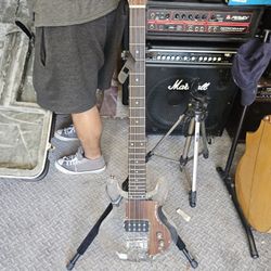 Both Acrylic Bass And 6 String Electric Guitars With Hard Cases