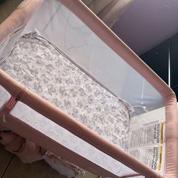 Pink Baby Bassinet (with storage + wheels)