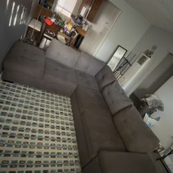 Flinn Grey Fabric 103" 2 Piece Convertible Futon Sleeper L-Shaped Sectional with Right Arm Facing Storage Chaise