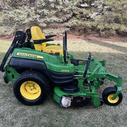 John Deere Zero Turn Commercial Lawn Mower with a 60 in deck mulch on demand deck 60 in deck and a 29HP Kawasaki motorand