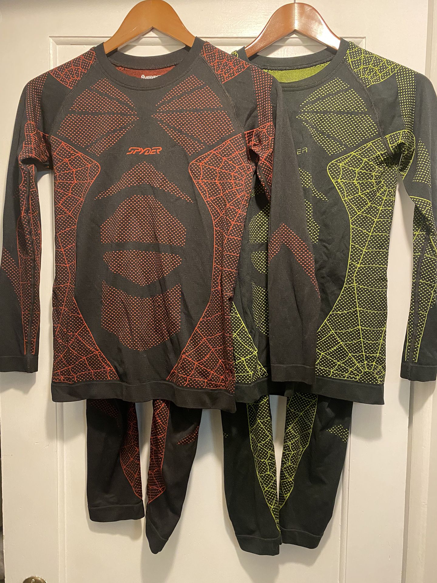 One set of Spyder Caden base layer top and bottoms red or green L/XL kids