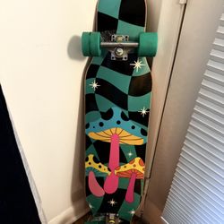 Skateboard with mushroom design