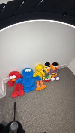 Kaws Sesame Street Uniqlo plushies full set