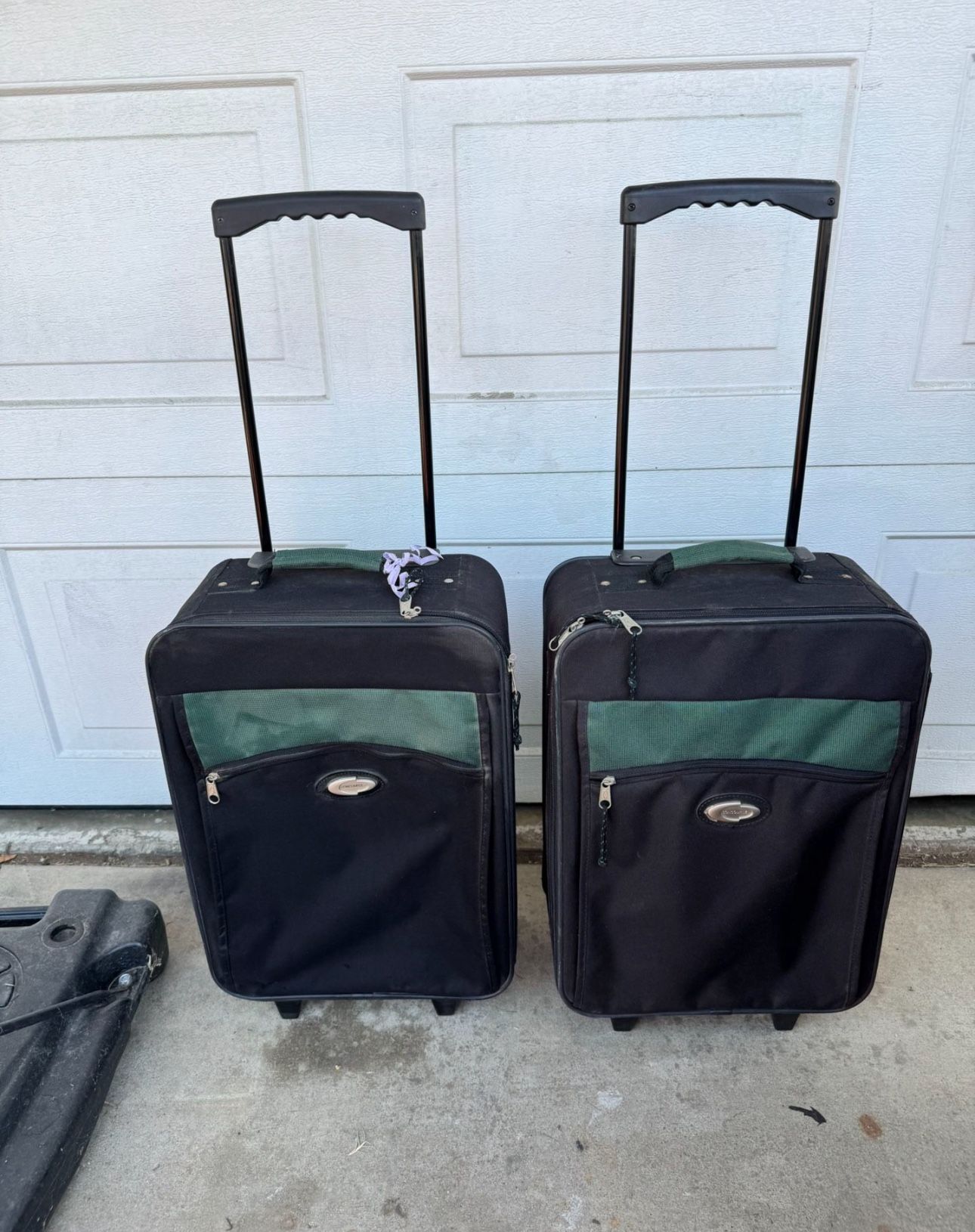 2 Carry-on Luggages  Size 23” Long  13” Depth 8”   $20 Each