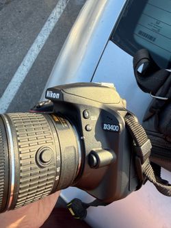 Nikon D3400 DSLR Camera Bundle – 18-55mm VR + 70-300mm Lens + Bag + Charger