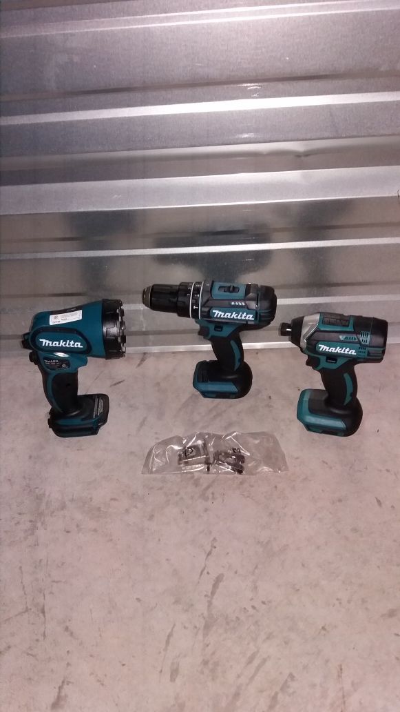 Brand new makita 18v impact flashlight And hammer drill tool only no battery no charger