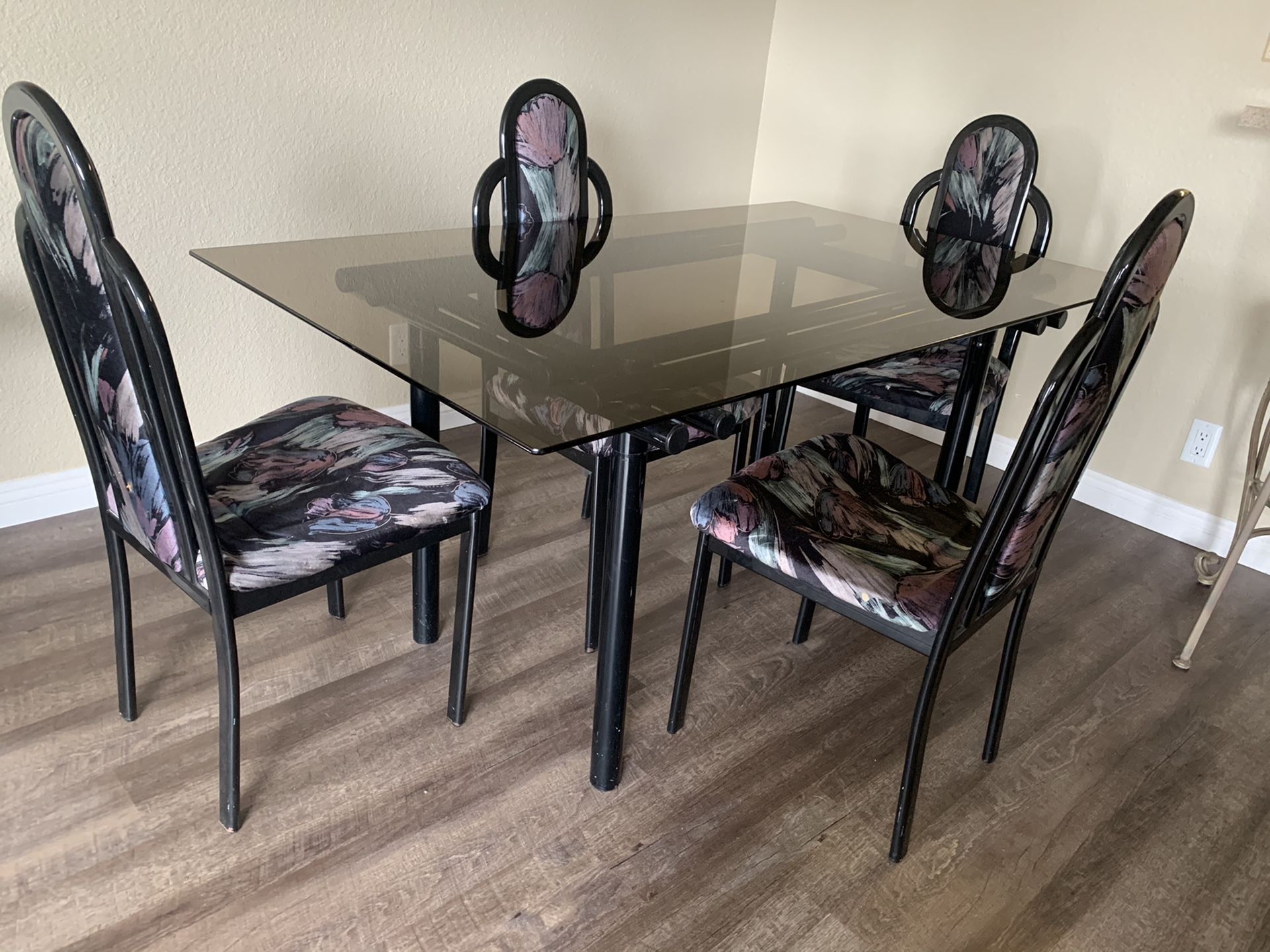 Glass table and chairs.