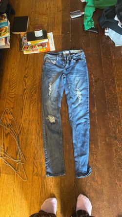 mid-rise slightly ripped skinny jeans