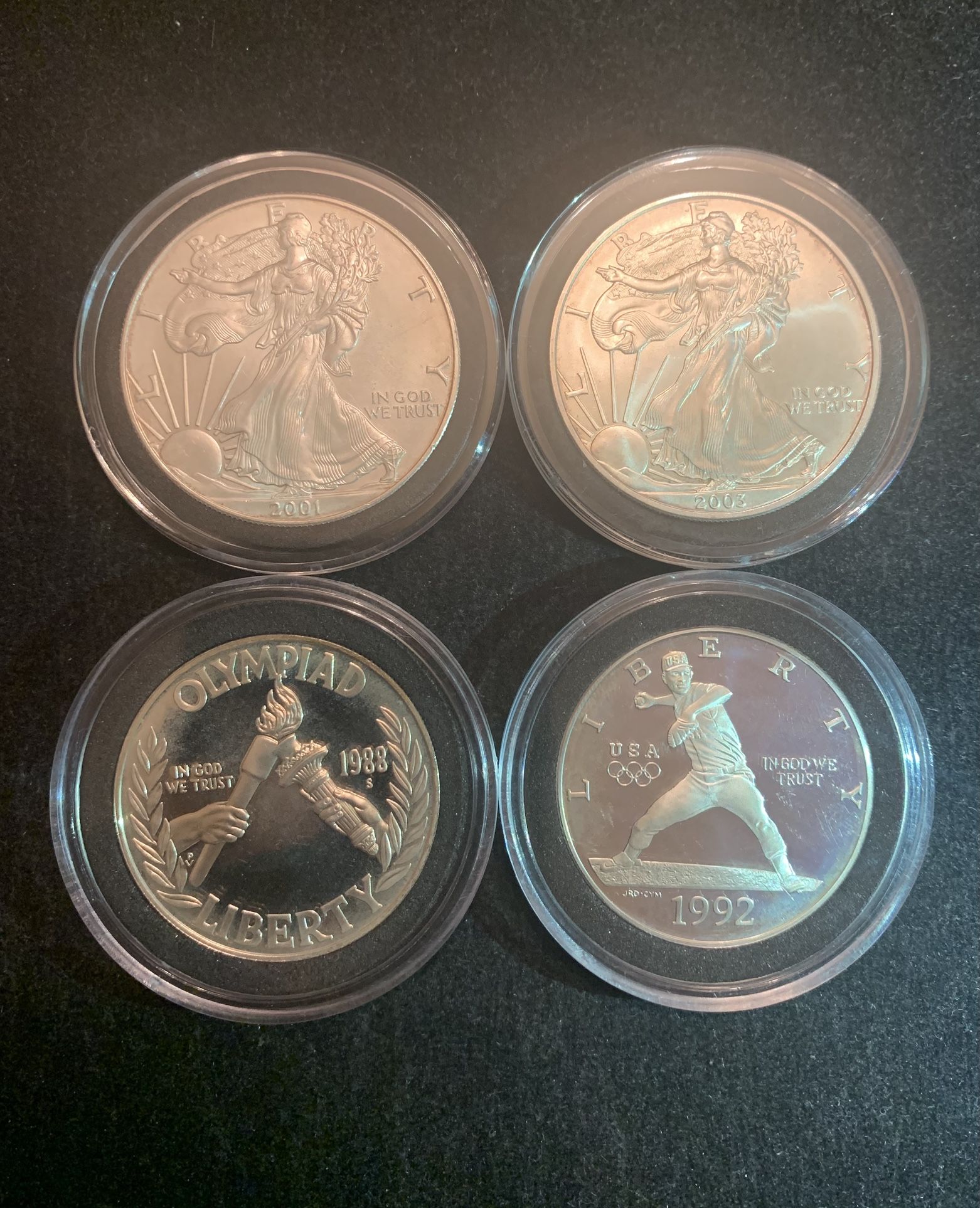 4 One Dollars U.S. Silver Coins