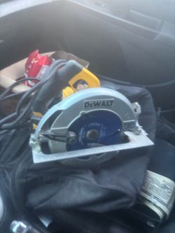 DeWalt Skil saw with bag