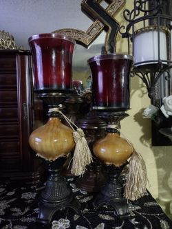 Home interiors solo los 2 candeleros las velas son aparte pregunté por precio
