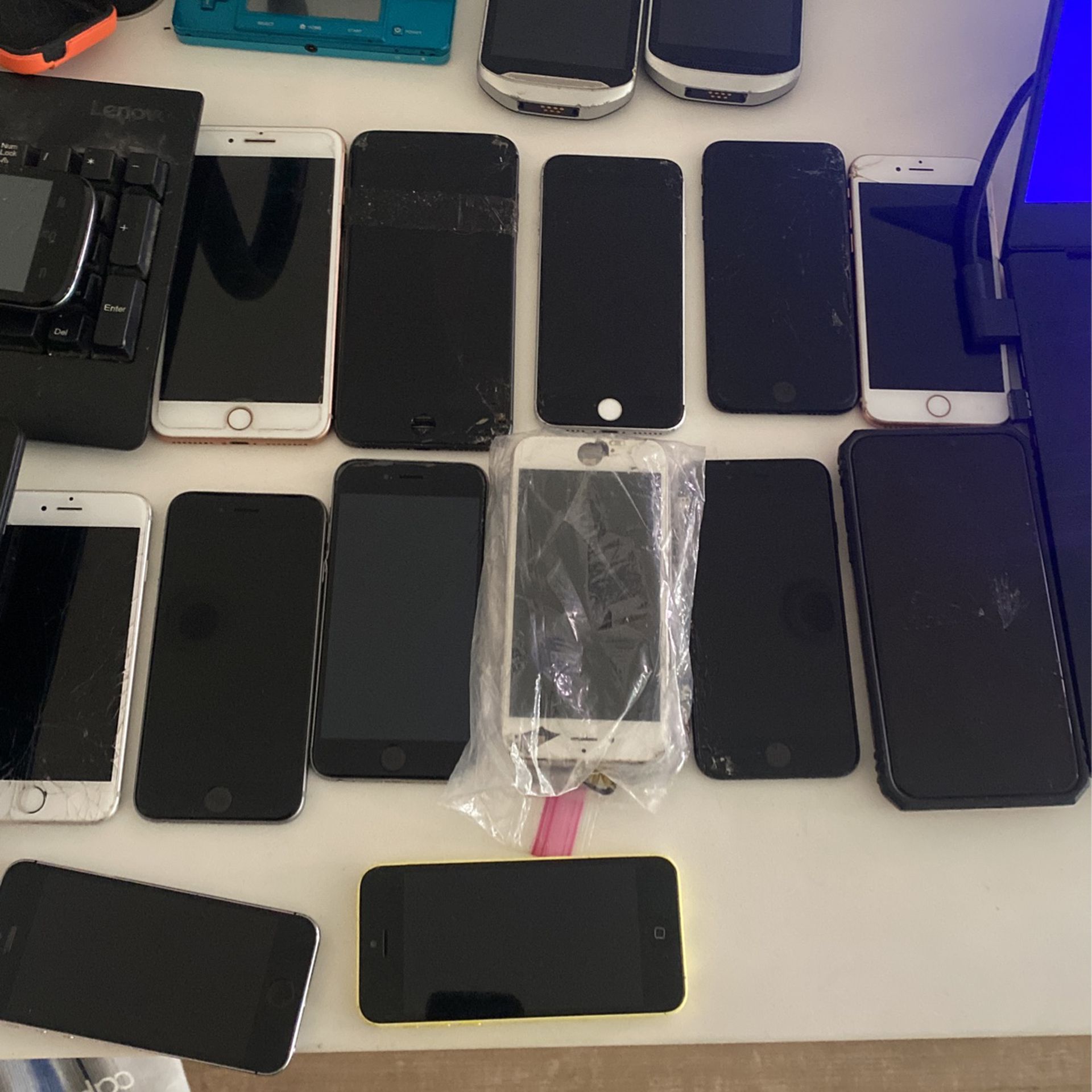 Assortment Of Phones Apple, Samsung, Nokia, LG