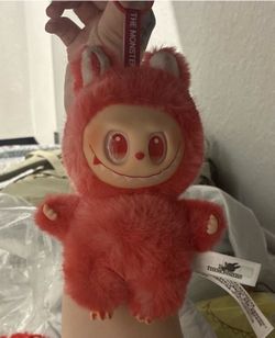 This is a POP MART Labubu The Monsters "Love" plush pendant from the Big Into Energy series.