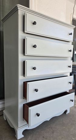 Nice solid wood dresser.
