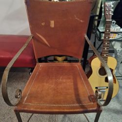 VINTAGE SCULPTURAL LEATHER CHAIR