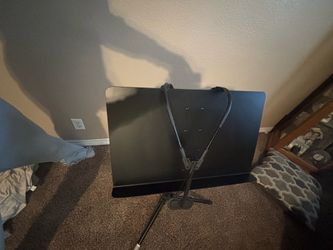 Music stand and two saxophone stands