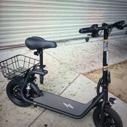 PHANTOM R1 PRO 500W POWER- 15.5 MPH- RANGE 20MILES- REAR SHOCKS-DUAL DISK BRAKES. LOAD CAP. 220-265 LBS FOLDING CHARGE TIME 4 HRS REAR BASKET  HEAD LI