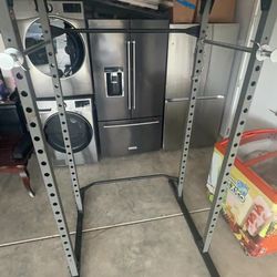 Pull up bar, incline barbell, curl up bar, olympic weights 2x 35, 2x 25, 2x 10